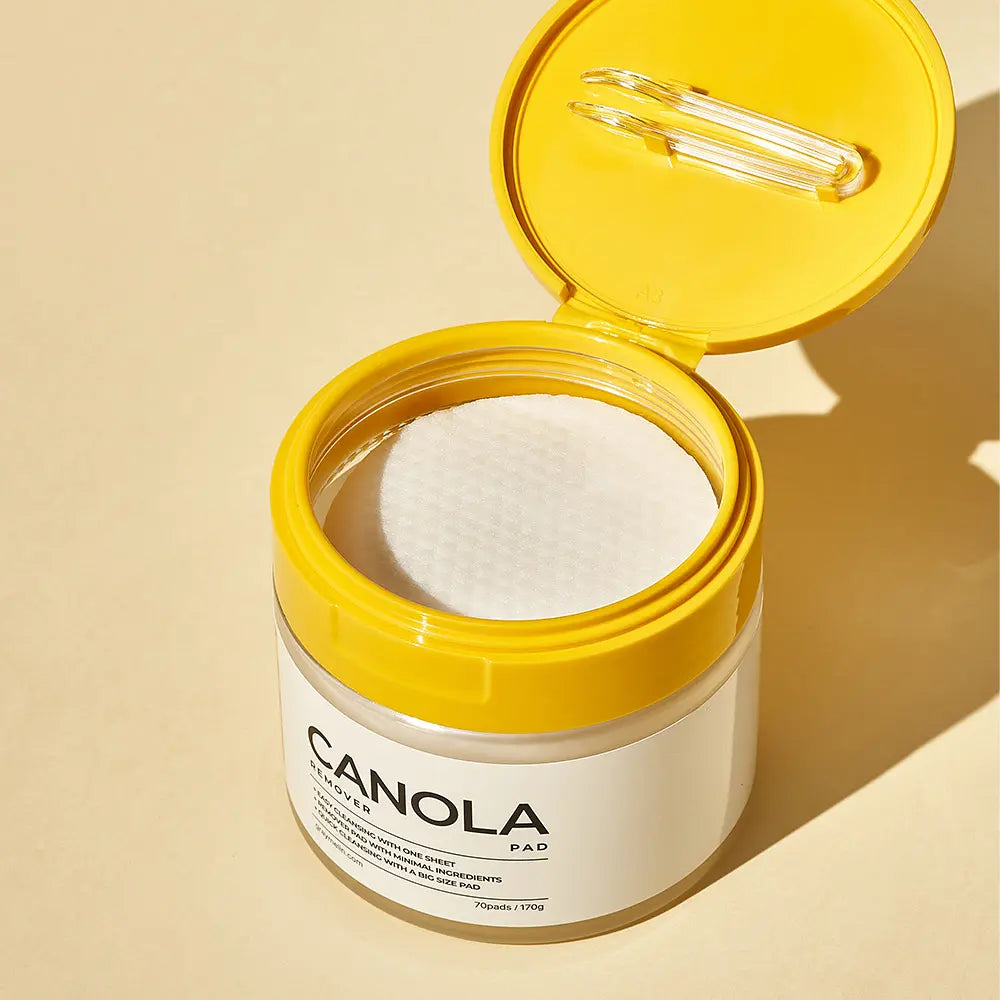 GRAYMELIN canola cleansing pads in a yellow jar, showcasing the gentle cleansing pads inside.